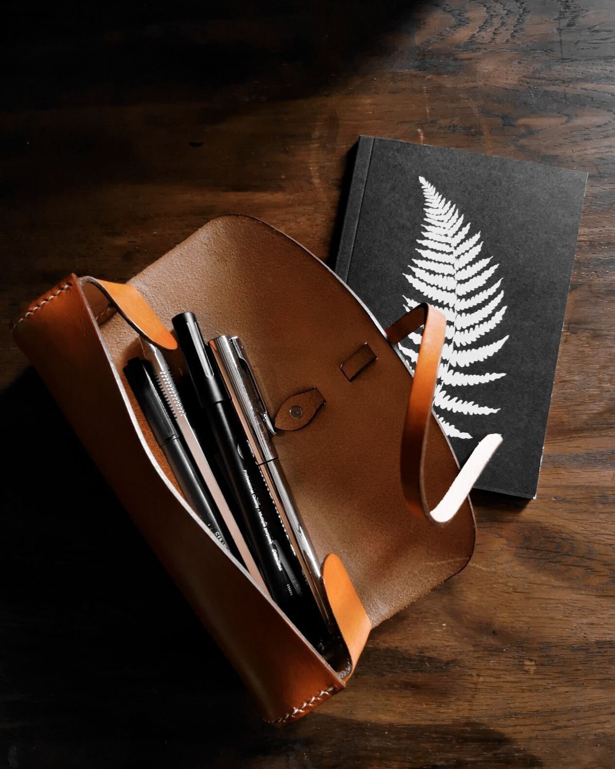 Trousse ronde En Cuir