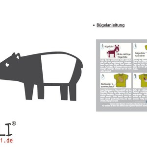 May include: A black and white illustration of a tapir with the text "Inhalt: B&uuml;gelbild" and "B&uuml;gelanleitung" on a white background. The image also includes instructions for ironing on a fabric.