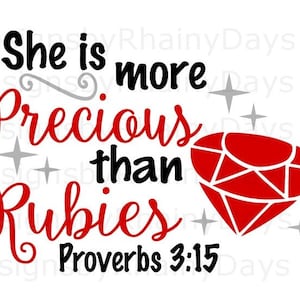 May include: A red and black graphic design with the text "She is more precious than rubies Proverbs 3:15". A red ruby gemstone is featured on the right side of the design.