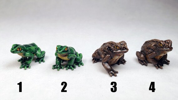 Painted some Giant Frogs. First time with Reaper Bones Black minis