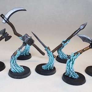 May include: Six miniature fantasy weapons on blue wave bases. The weapons include a scythe, a hammer, a dagger, a spear, a mace, and a spiked club.