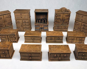May include: A collection of 13 miniature wooden cabinets and chests with various designs and details. The cabinets are painted in a brown wood finish and have metal accents.