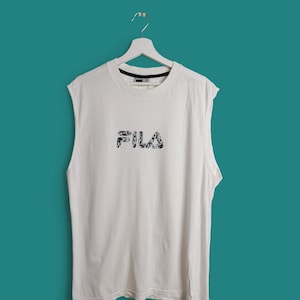 FILA Vintage 90&#39;s FILA Unisex Big Spell-out Faded Logo Tank Top /Vest /  T-Shirt in White ~ size L-XL