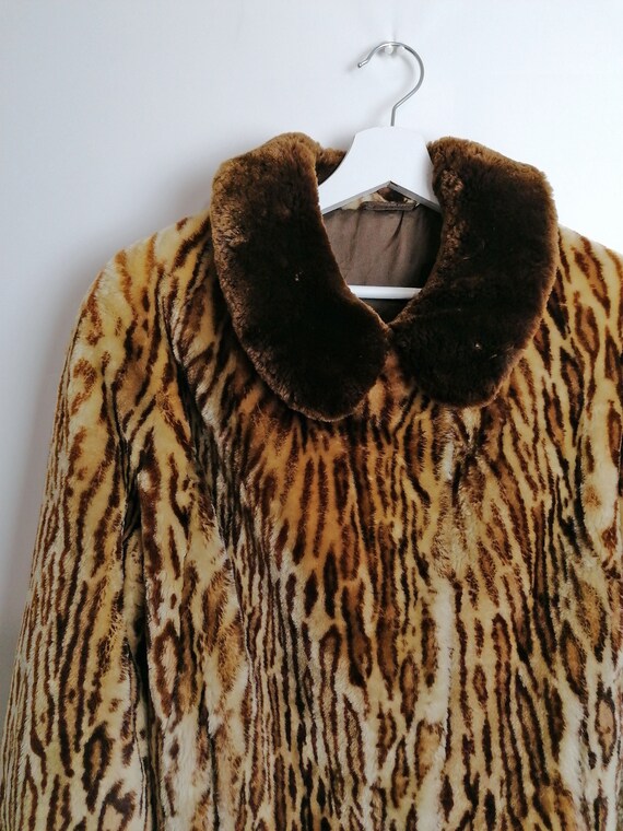 Vintage 2000’s animal print faux fur jacket