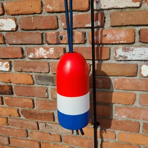 Red, white and blue buoy. Americana buoy, independence day buoy