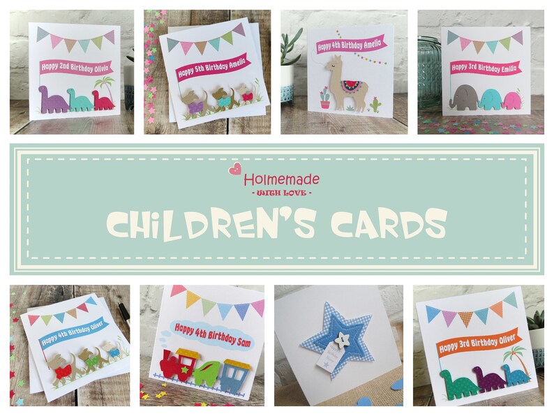 May include: A collection of square greeting cards featuring colorful die-cut designs including dinosaurs, dogs, llamas, elephants, trains, and stars. Each card displays a banner with text such as Happy Birthday and a name, plus bunting.