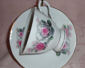 Vintage Yang Sheng Porcelain Company Teacup and Saucer Set