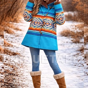 May include: A white ceramic mug with a black handle and the text "But first, coffee" in a black, handwritten-style font. The mug is on a white surface.