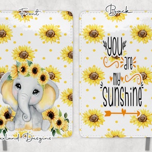 May include: A white notebook cover with a yellow sunflower pattern and a cute gray elephant with a sunflower crown. The back cover has the text "You are my sunshine" with a yellow arrow and hearts.