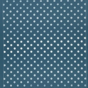 May include: A blue background with a white polka dot pattern. The dots are evenly spaced and create a repeating pattern.
