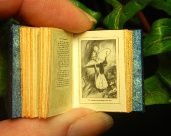 Alice's Adventures in Wonderland: a leather miniature book in 12th scale, hand bound in dark blue with original antique illustration