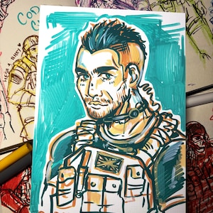 May include: A hand-drawn illustration of a soldier in combat gear, set against a teal backdrop. The artwork includes a portrait with a headset and a Union Jack patch. The artist's signature and the word "SOAP" are visible.