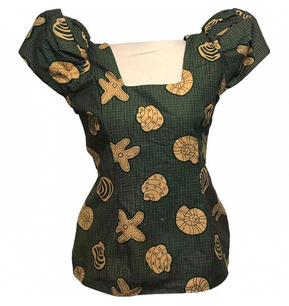 Vintage . 1970 buttoned shoulders blouse . Sea pat