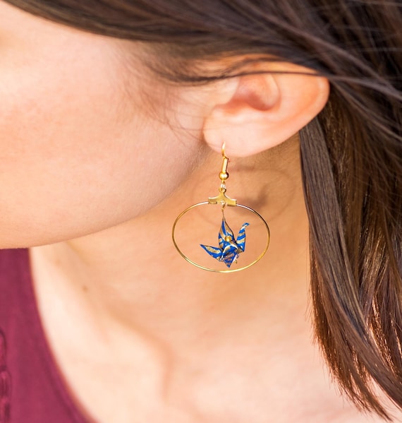 Blue origami crane earrings with golden waves