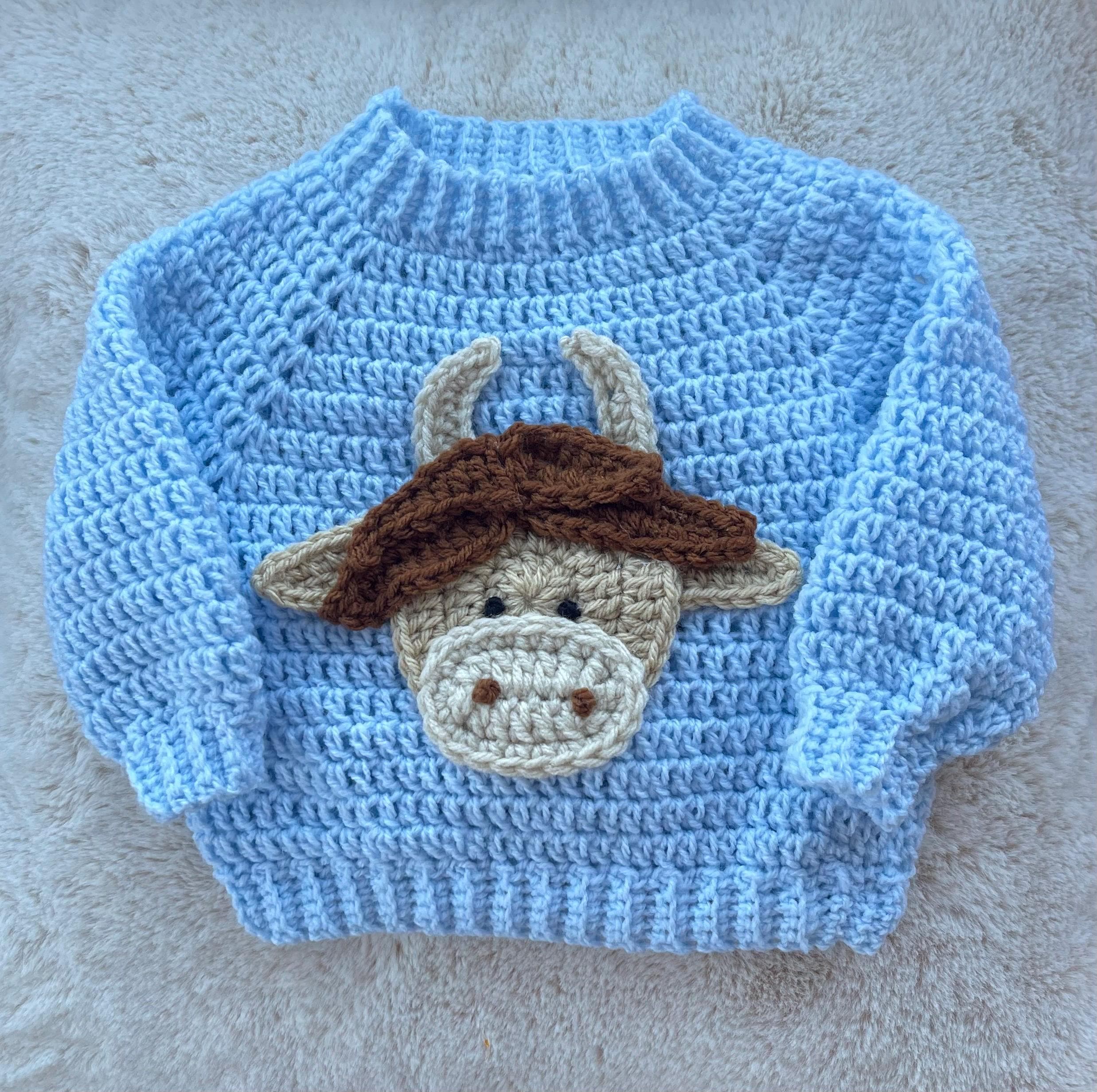 Crochet highland cow baby sweater