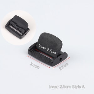 May include: Black plastic buckle with a 2.5 inch inner width. The buckle measures 3.1 inches long and 2.7 inches wide.  Inner 2.5cm Style A.