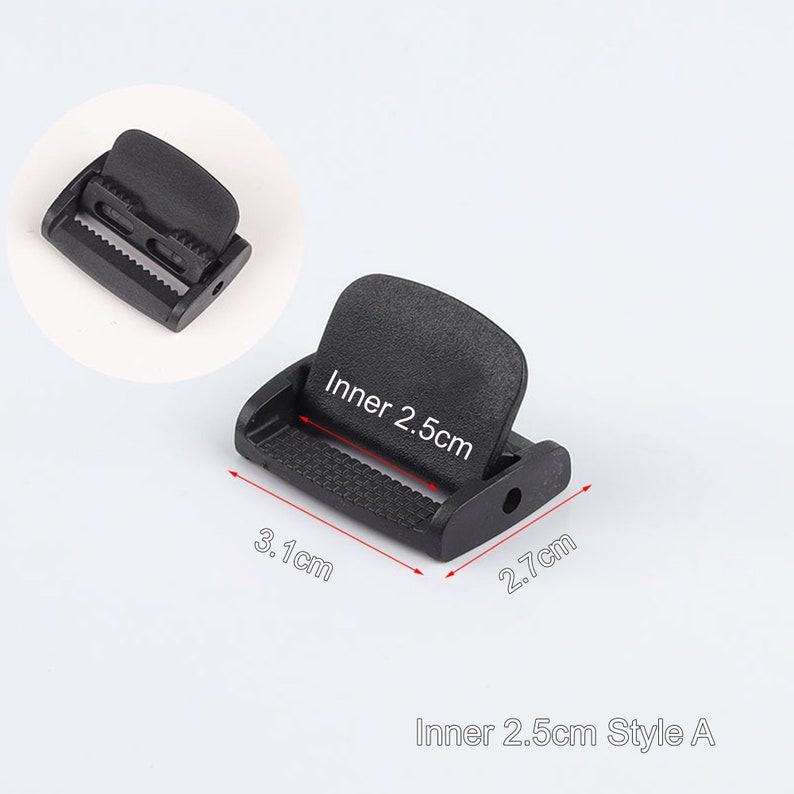 May include: Black plastic buckle with a 2.5 inch inner width. The buckle measures 3.1 inches long and 2.7 inches wide.  Inner 2.5cm Style A.