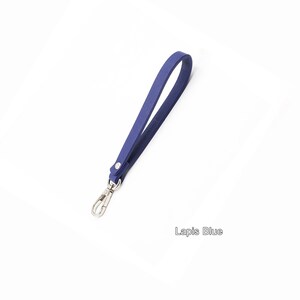 May include: A blue leather strap with a silver swivel clasp. Lapis Blue.