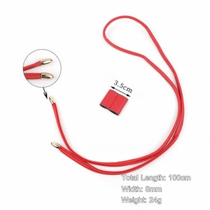 May include: Red leather cord with gold-toned metal tips. The cord is 100 cm long, 8 mm wide, and weighs 24 grams. Total Length: 100cm Width: 8mm Weight: 24g
