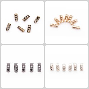 May include: Assortment of metal cord ends in gold, silver, and bronze. The cord ends have two holes and are used for securing cords and straps.