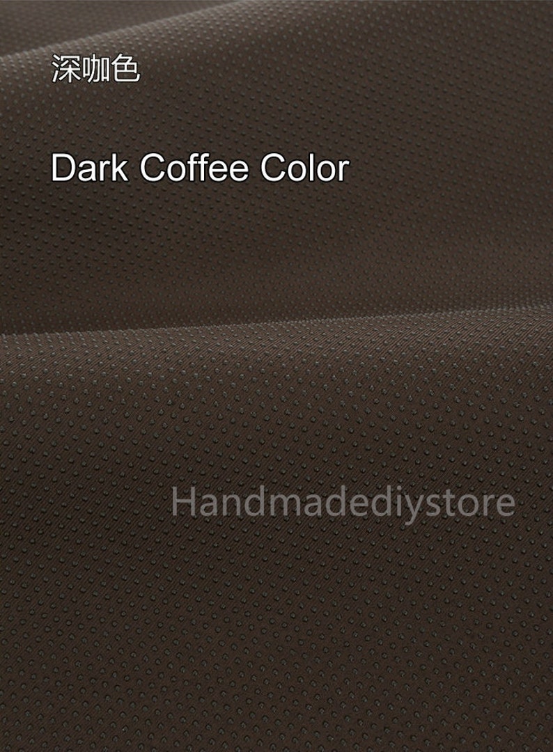 May include: Close-up of a dark brown fabric with a textured surface. The fabric has a subtle pattern of small dots. The text "Dark Coffee Color" is visible in the image.