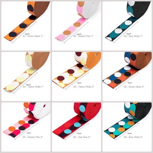 May include: Nine different 1-inch wide elastic bands with polka dots in various colours. The bands are 10 cm long and are available in colours like brown, black, golden pink, yellow, red, and blue.