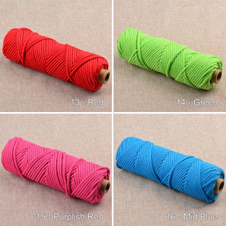 May include: Four spools of cotton rope in different colors: red, green, pink, and blue. The spools are labeled with numbers and color names.