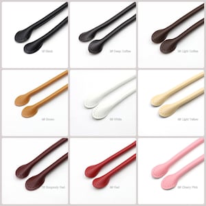 May include: Nine different colors of leather handbag straps. The straps are about 12 inches long and have a loop at each end. The colors are black, deep coffee, light coffee, brown, white, light yellow, burgundy red, red, and cherry pink.
