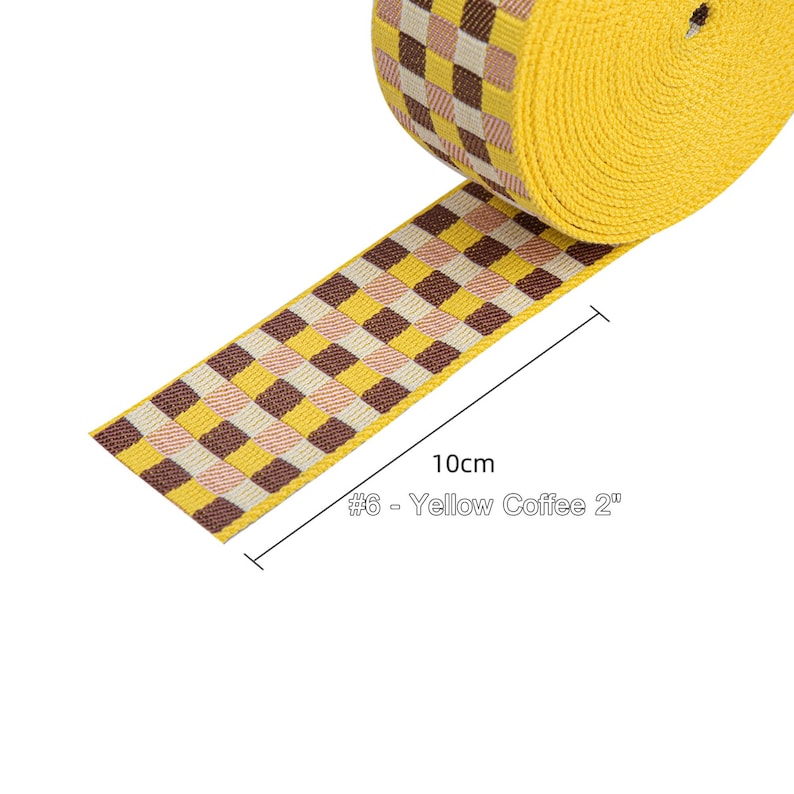 May include: Yellow and brown checkered webbing ribbon, 2 inches wide, with a 10cm measurement label. #6 - Yellow Coffee 2"