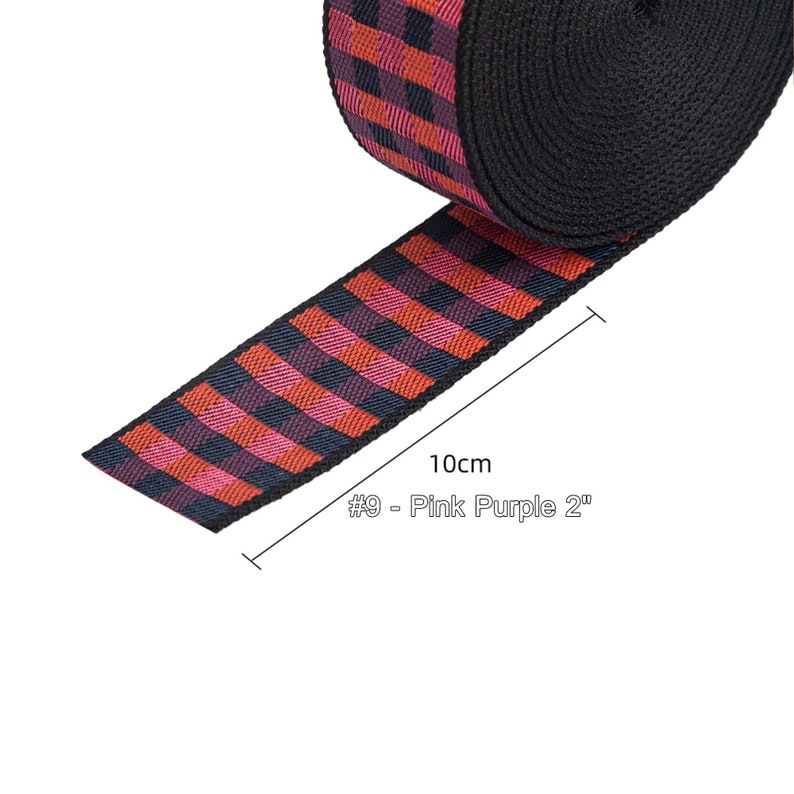 May include: Pink and purple plaid webbing with black trim. The webbing is 2 inches wide and 10 cm long. #9 - Pink Purple 2"