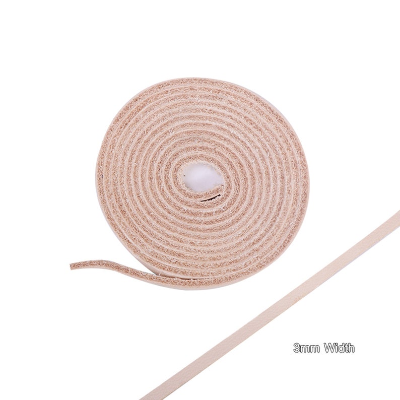 May include: A roll of 3mm wide natural leather cord. The cord is rolled up and the end is extended to show the width.