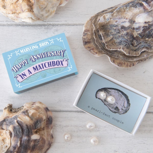 Happy Anniversary message and two freshwater pearls In A Matchbox