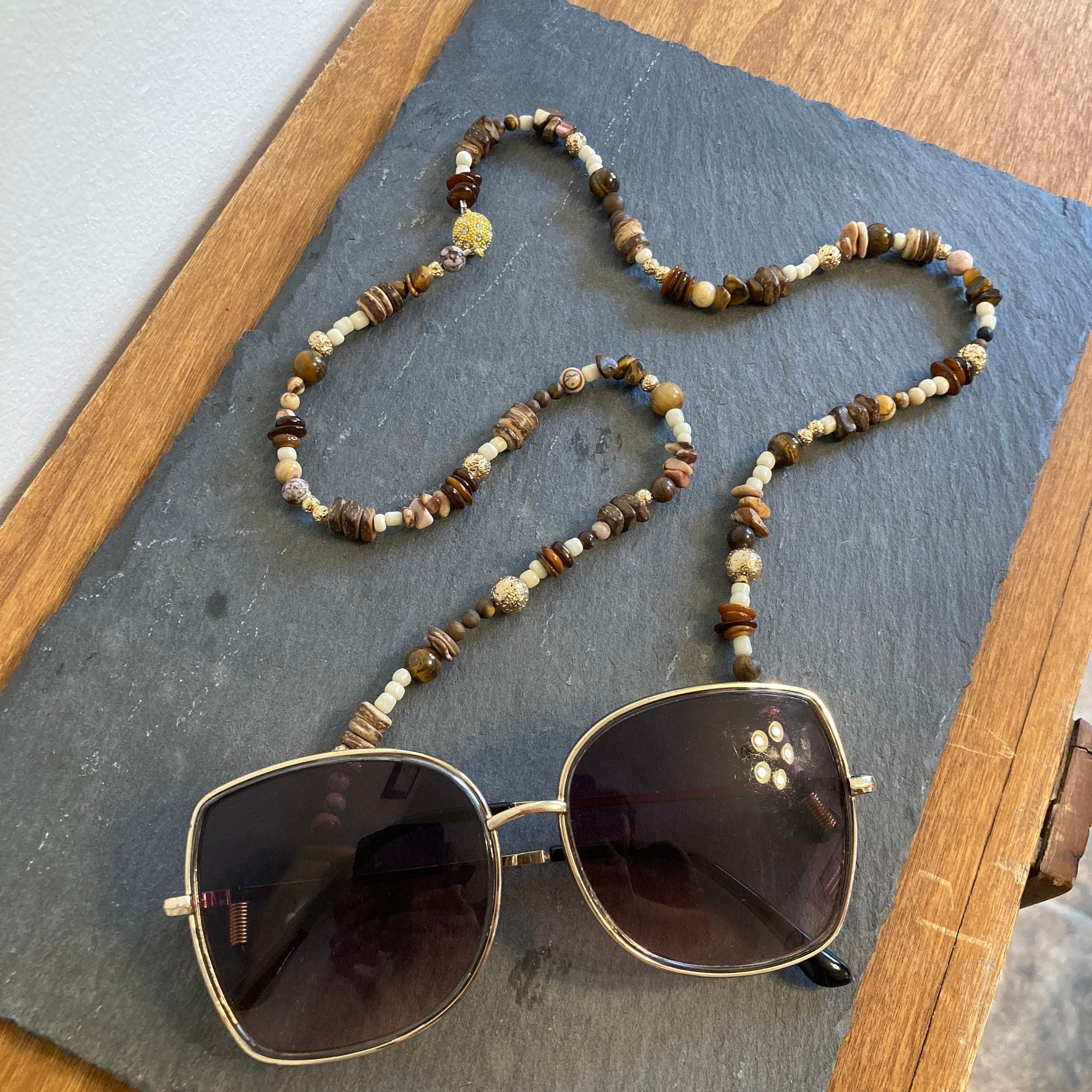 Women's glasses chain in old gold color
