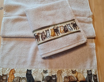 Towel with a cat border, domestic cats, different breed cats, school, colors grey, brown, ochre, children, sports, adults