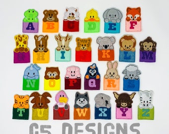 May include: A set of 26 felt finger puppets featuring different animals and letters of the alphabet. The puppets are colorful and have a variety of designs, including a giraffe, a koala, a fox, a penguin, and a tiger. The puppets are arranged in alphabetical order and are perfect for teaching children the alphabet.