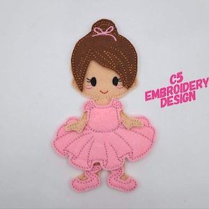 May include: Embroidered felt appliqué of a ballerina doll with brown hair, a pink dress, and pink shoes. The doll is smiling and has a pink bow in her hair. The text "C5 EMBROIDERY DESIGN" is in the upper right corner of the image.