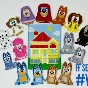 May include: A set of 12 felt finger puppets featuring characters from the children's show PAW Patrol. The puppets are colorful and include a house, a dog, a cat, and other characters. The set is labeled "FF SET #V".