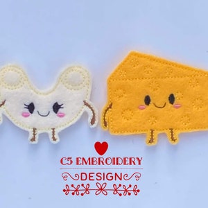 May include: Two felt applique characters, a smiling piece of cheese and a smiling macaroni noodle, with embroidered details.  The cheese is yellow and the macaroni is white.  Both characters have small brown legs and arms.  The text "C5 EMBROIDERY DESIGN" is below the characters.
