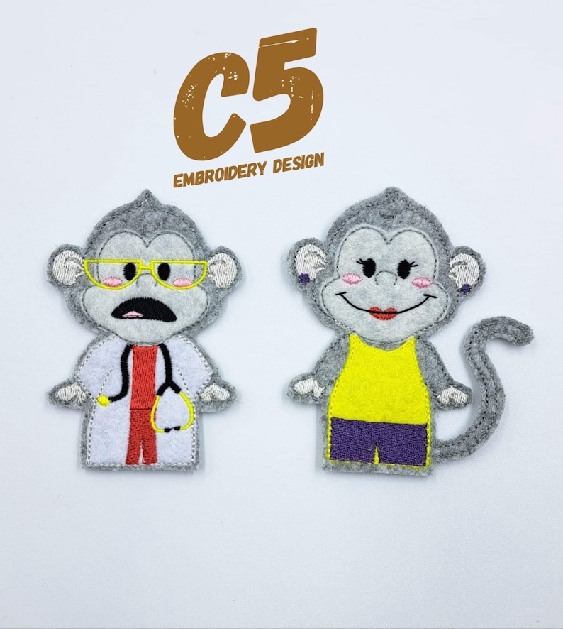 May include: Two felt finger puppets of monkeys. One monkey is wearing a doctor's coat, a stethoscope, and glasses. The other monkey is wearing a yellow tank top and purple shorts. The text "C5 EMBROIDERY DESIGN" is above the puppets.