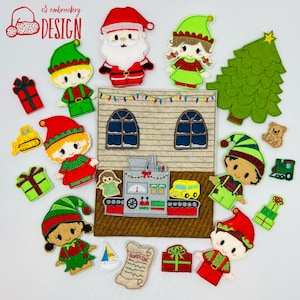 May include: A felt Christmas scene with Santa, elves, and a toy workshop. The scene includes a house with windows, a toy train, a toy truck, a toy bulldozer, a Christmas tree, presents, and a list of toys. The characters are all wearing red and green clothing.