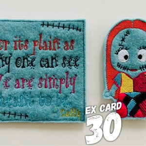 May include: A blue felt card with the text "For its plain as any one can see We are simply meant to be - Sally" and a felt applique of Sally from the Nightmare Before Christmas.