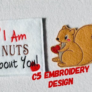 May include: Embroidered patch with a brown squirrel holding a red heart and the text "I Am NUTS About You!" with red hearts on either side. The text "C5 EMBROIDERY DESIGN" is below the squirrel.
