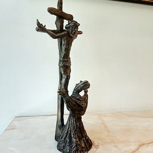 Realistic bronze sculpture of the crucifixion of the Lord Jesus Christ