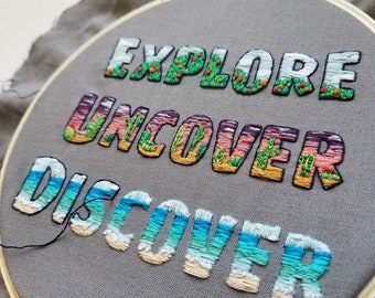 Explore Uncover Discover hand embroidery pattern PDF, modern landscape text design, desert mountains needlework, ocean cross stitch project