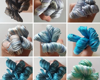 DMC color variations cotton embroidery floss: 4000 through 4040. Single skein of cross stitch floss. Variegated six stranded thread.