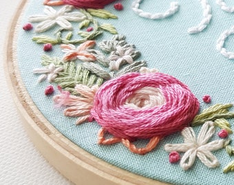 Rose wreath craft project, DIY custom baby hoop art, handmade gift idea for nursery, modern hand embroidery pattern, flower needlepoint pdf