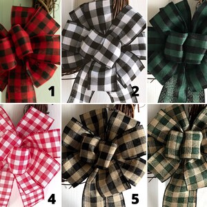 May include: Six different plaid ribbon bows in various colors, including red, black, white, green, and tan. The bows are tied in a simple knot and are perfect for adding a touch of rustic charm to any project.