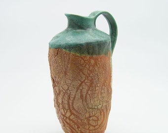 Wood fired ceramic pitcher