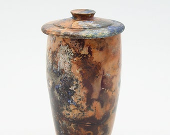 Pit fired lidded ceramic jar