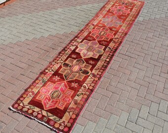Vintage Handwoven Wool Kilim Runner: 2.7 x 12.2 ft, Anatolian Red Carpet